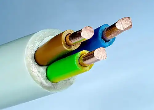 Image 18 Thermoplastic-sheathed cable Photograph credit: Petar Milošević A thermoplastic-sheathed cable consists of a toughened outer thermoplastic sheath of polyvinyl chloride, covering one or more individual annealed copper conductors. Each of the current-carrying conductors in the "core" is insulated by an individual thermoplastic sheath, coloured to indicate the purpose of the conductor concerned. The protective earth conductor may also be covered with insulation, although, in some countries, this conductor may be left as bare copper. The type of thermoplastic, the dimensions of the conductors and the colour of their individual insulation are specified by the regulatory bodies in the various countries concerned. More selected pictures