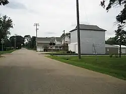 A view toward buildings in Eleroy including the U.S. Post Office.