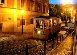 Night-time view of a graffitied tram, on one of the lower section's interleaved tracks