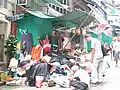 A stall selling miscellaneous goods on the street in 2005