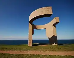 Elogio del Horizonte (Eulogy to the Horizon), concrete (1989), a&nbsp;10-meter-tall (33&nbsp;ft) contemporary monumental sculpture, by Eduardo Chillida, at Gijón, Spain