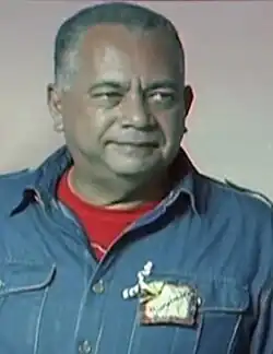 Headshot of Amoroso, who is wearing a denim jacket