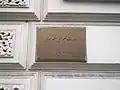Plaque outside the embassy in Dari and English