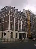 The embassy building today. While the façades of the two houses that stood on this site, with slightly different designs, can still be distinguished, the two doorways were replaced with one during the 1970s rebuilding.