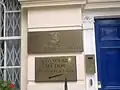 Plaque outside the embassy depicting the Coat of arms of Liberia