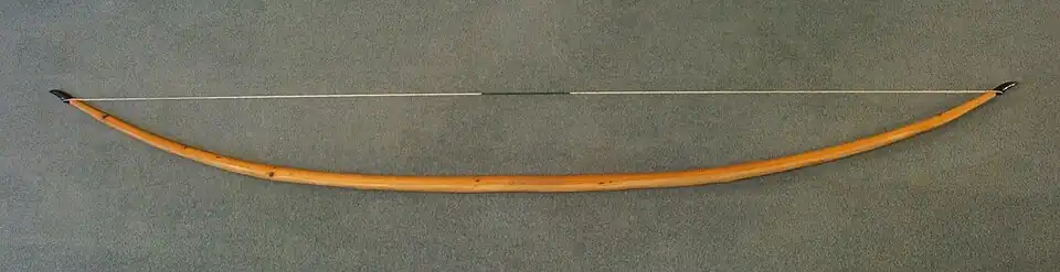 The English longbow – a simple but very powerful spring made of yew, measuring 2&nbsp;m (6&nbsp;ft 7&nbsp;in) long, with a 470&nbsp;N (105&nbsp;lbf) draw weight, with each limb functionally a cantilever spring and the entire bow acting as an extension arc spring.