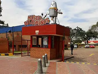 Stand-alone ticket booth with a robot statue