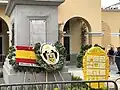 Logo next to the statue of Pizarro