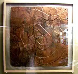 Ogee motif-repousse copper plate from the Etowah Site