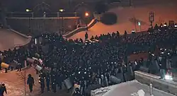 Crowd of Berkutians on Institutskaya Street ready to attack