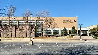 Exterior view of the main entrance of John Paul II High School in Plano, Texas