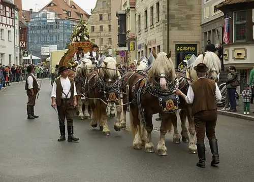 Team of six drawing a brewer's dray