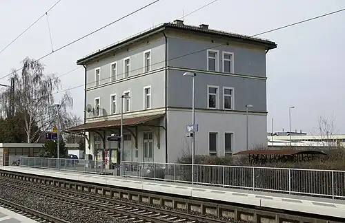 Three-story building with hip roof