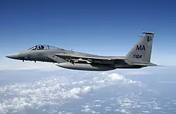 A jet flying over the ocean