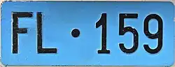 Utility vehicle license plate, older series.