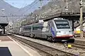 Second Cisalpino livery (CIS version). Here, the ETR 470 001 passes through Biasca Railway Station while traveling as EuroCity 17 from Zurich to Milan in 2012