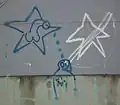 Derogatory graffiti, using a phallus, aimed at fans of Wisła Kraków. Pictured in Poznań, Poland, 2016