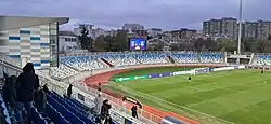 A stadium photographed from its western stand