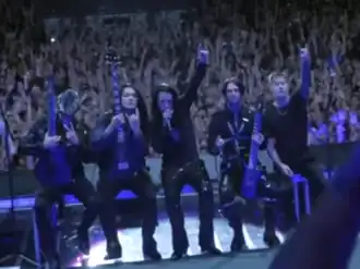 Falling in Reverse performing in 2023. From left to right: Christian Thompson, Tyler Burgess, Ronnie Radke, Max Georgiev, and Luke Holland