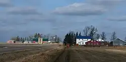 Two Amish farms across the road from each other