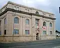 Government of Canada offices at the corner of May and Leith, an example of Beaux-Arts Classicism.[35] Constructed in 1913 of limestone, its architectural elements have been reduced to their bare essentials, representing a movement toward modern classicism.[36]