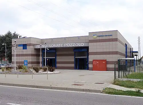 Square two-story building with flat roof