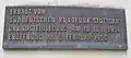 Commemorative plaque at the tower's base