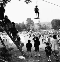 The Summer Fête on Home at Caterham in the mid-20th century, with the Home Front of the Old School in the background.