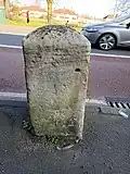 London Road milestone opposite Figges Marsh, looking east