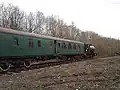 A passenger train in the cleared goods yard at Whitwell