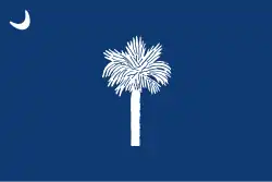 Design approved by Alexander Samuel Salley Jr., the Historical Commission's secretary, featuring a tilted crescent and a palmetto adapted from artwork by Ellen Heyward Jervey[29][30]