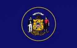 Unofficial 1913 to 1981 variant featuring a gold ring around the state seal[20]
