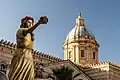 Float of Saint Rosalia pictured in front of the dome.