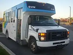 A 2008–2022 Ford E-Series STM bus used for the paratransit service