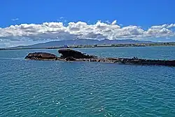 The wreck seen from the memorial, c. 2016