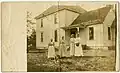 Four women outside the Rognlie parsonage, Franklin, Minnesota