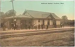 Postcard view of a small railroad station