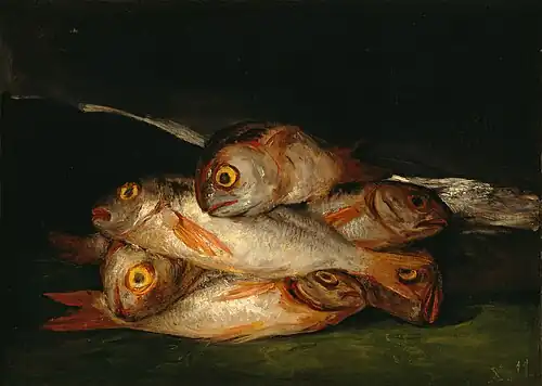 Pictorial allusion to his painting "Enterrar y callar (Bury them and keep quiet) of his The Disasters of War series. Still Life with Golden Bream by Francisco Goya, 1808, Museum of Fine Arts, Houston.