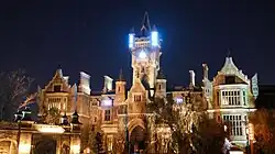 Frankenstein Manor at night with electrical effects in windows