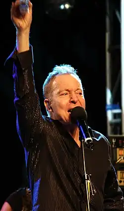 Fred Schneider performing in 2009