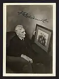 6. Fred Goldsmith Photo of himself looking at the Chicago White Stockings team photo. &nbsp;&nbsp;&nbsp;&nbsp;&nbsp;(late 1930s)
