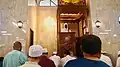 The Khatib giving the sermon during the Friday prayers.
