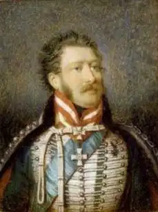 Painting shows a man with light brown hair and a moustache wearing a fancy hussar uniform.