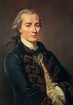 Oil painting of a man in a dark coat with golden embroidery and his arms crossed
