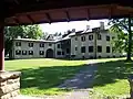 Estate as seen from the rear during summer