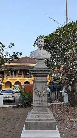 Front view of the bust. Seen behind is the former Casa da Moeda (Mint House), where he lived while in Panaji