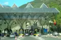 Border post between Spain and Andorra, a microstate that de facto follows Schengen immigration policies and utilises the Euro as its national currency yet is not a part of the European Union VAT and customs areas.