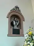 A memorial to Gabriel Goodman, born at Nantclwyd in 1528.