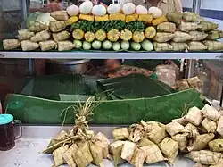 A gado-gado street stall featuring ketupat