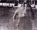 Woman wearing a Galway shawl in Galway, Ireland.
